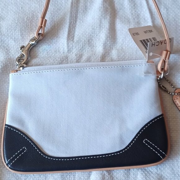 Coach Handbags - NEW WITH TAGS  Coach Zip Wristlet Wallet